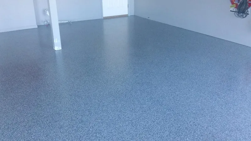 Blue-gray flake coating on a garage floor
