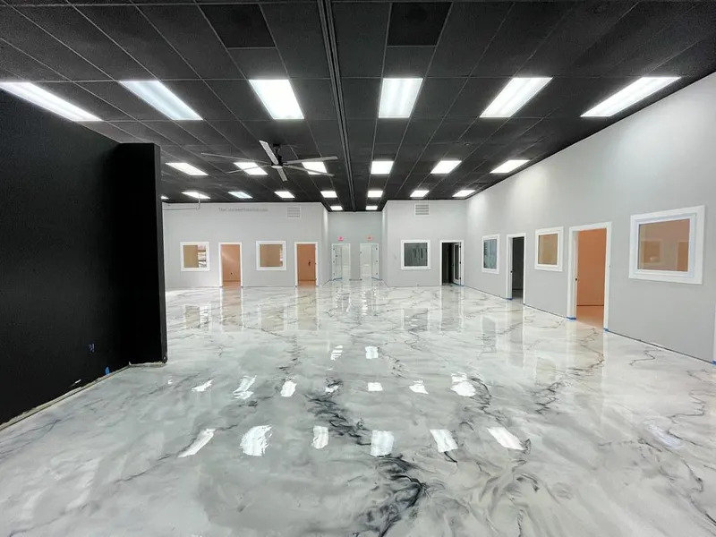 Marble-look metallic epoxy in an open commercial space
