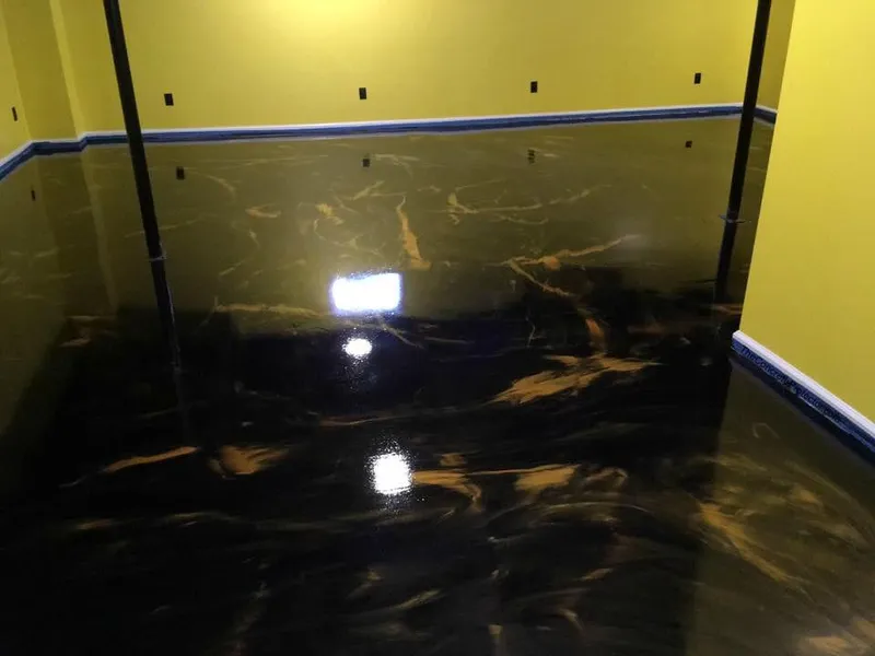 Black and gold metallic epoxy floor
