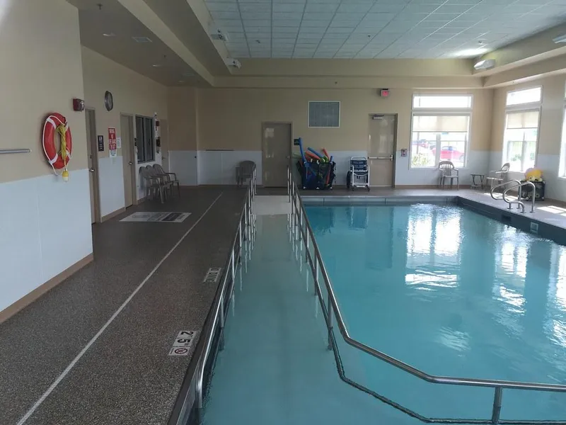 Flake coated walkway around an indoor pool